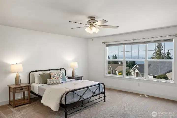 Stunning view from the primary bedroom, bathroom & main level!