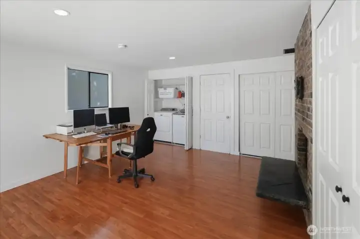 Family room, laundry area, see through fireplace to the right.
