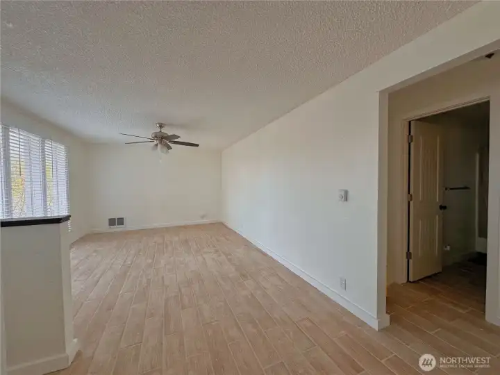 Living Room. New double pane windows & blinds throughout home.