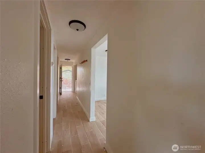 Hallway view towards covered carport.