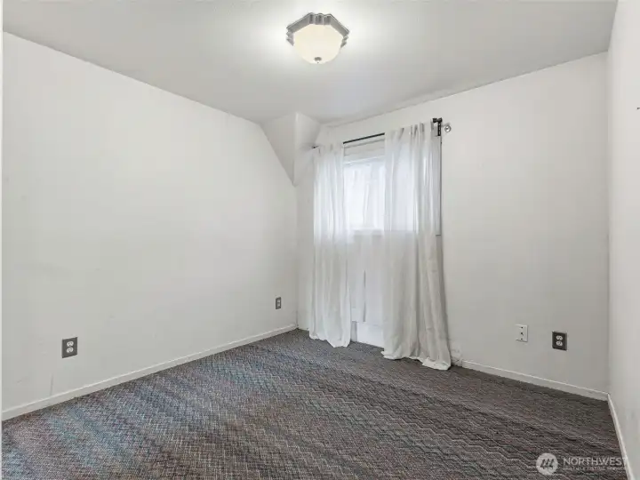 Bedroom located off the main living area.