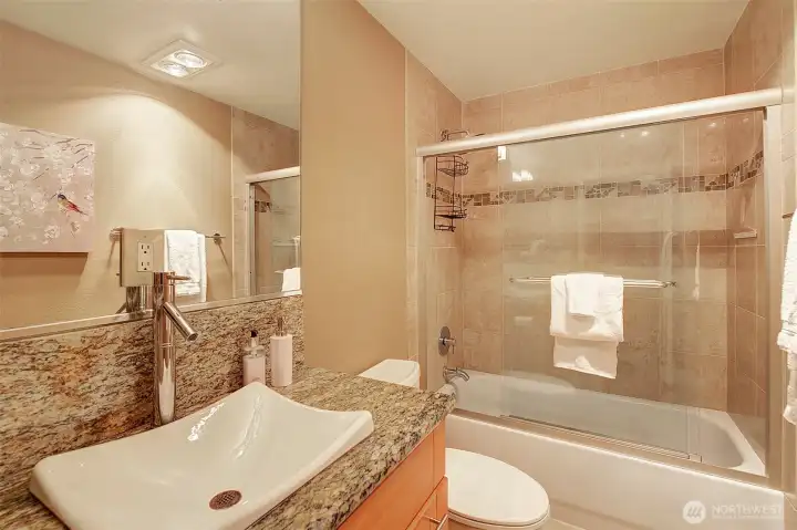 The stylish vanity and sink in bathroom #2.