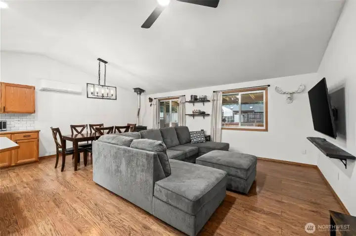 A pellet stove sits in the far corner and provides cozy warmth and ambiance on chilly evenings.