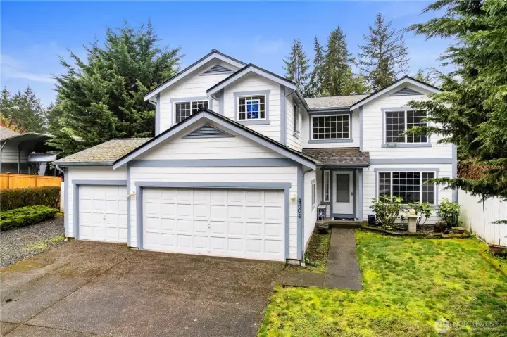 Plenty of parking with 3-car garage and large driveway.