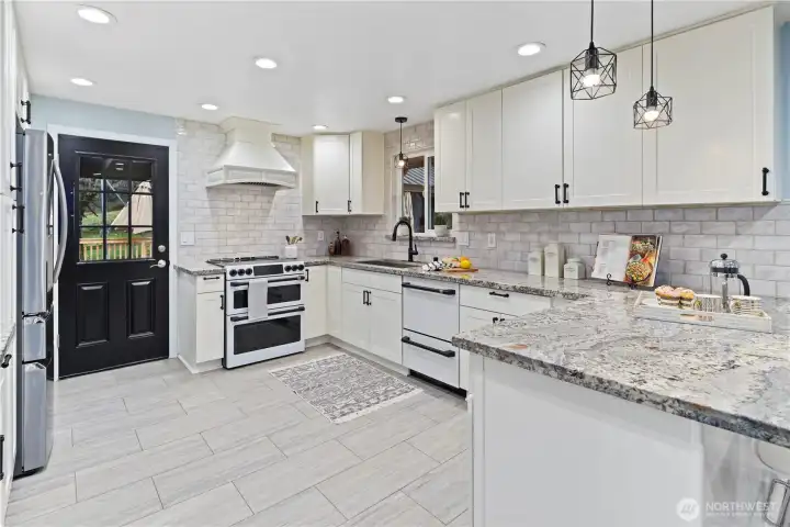 Backdoor leads to the deck & gazebo for alfresco dining!