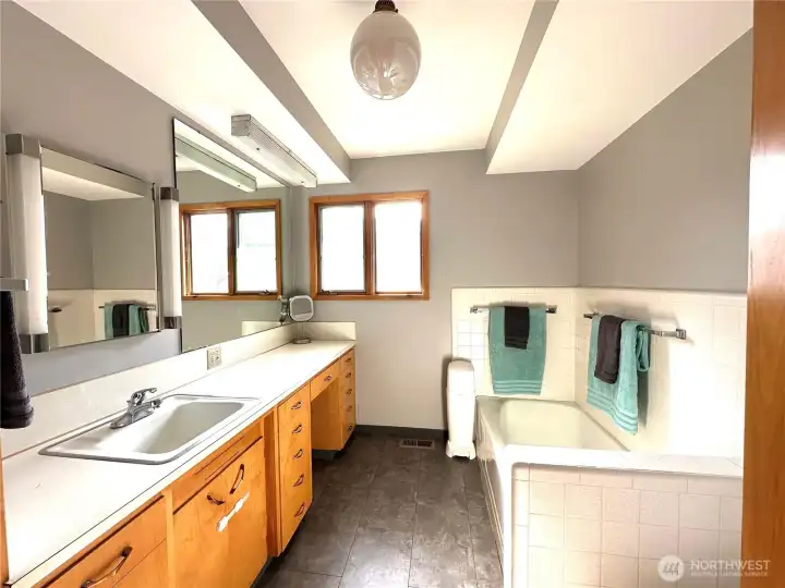 full bathroom with mid century modern touches