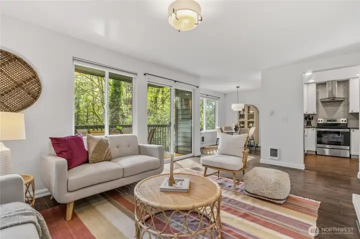 Living room flowing seamlessly into the dining room and kitchen