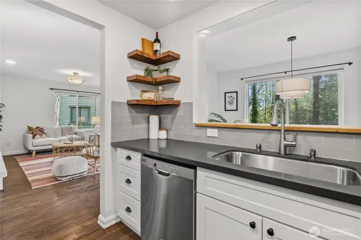 From kitchen looking into living room and dining room