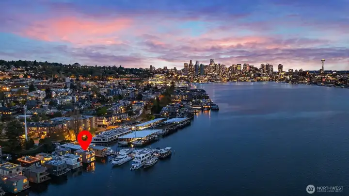 Aerial twilight shot placing the home in the context of the downtown Seattle skyline and the lights ringing Lake Union.