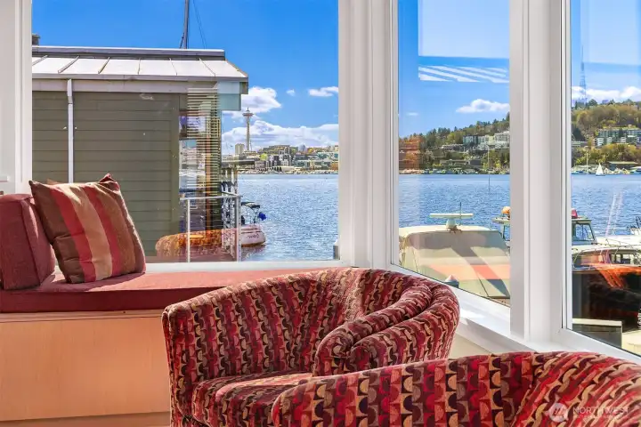 A closer read on the window seat, with Space Needle and Queen Anne Hill views.