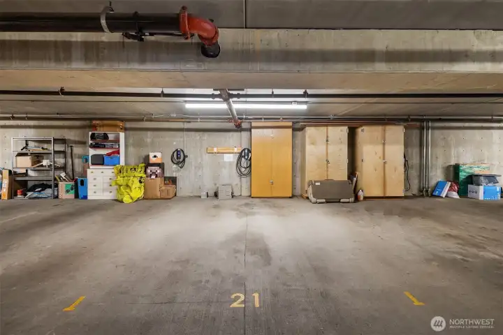There are two secure garage spaces in the underground garage, both with individual EV chargers, plus a private storage unit and extra storage cabinets.