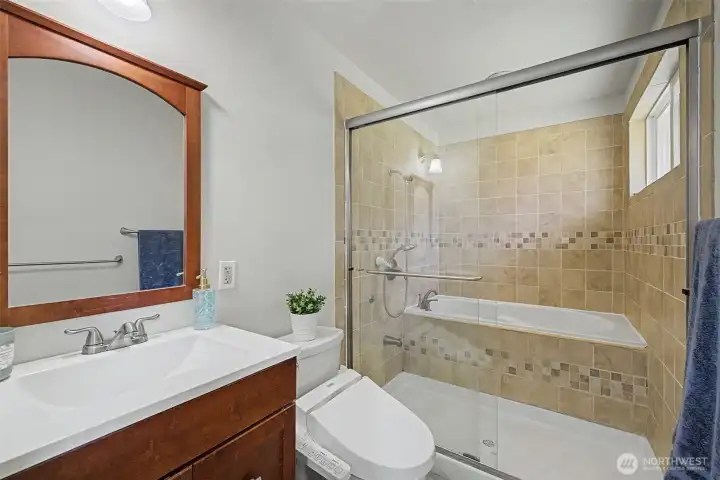 Primary bathroom has been renovated with japanese soaker tub/shower combo, new sinks, new toilets and more!