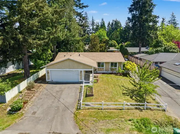 Large driveway and parking out front of home