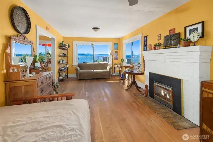 Main floor living room with gas fireplace.