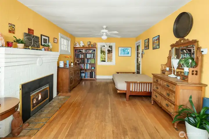 Main floor living room with gas fireplace.