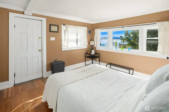 Lower level bedroom with en-suite bathroom and exterior access.