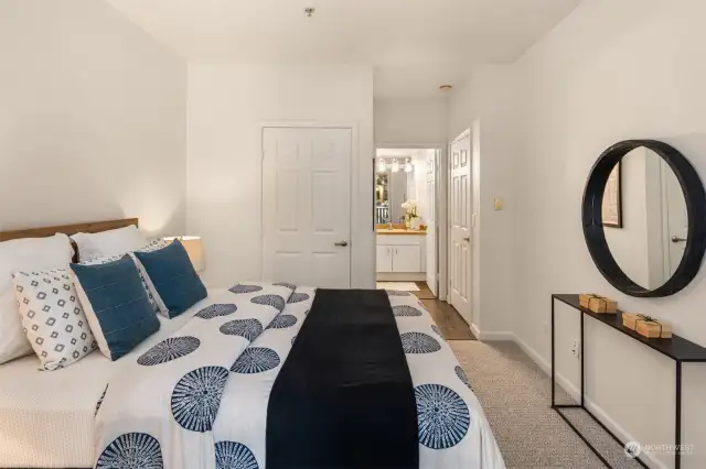 Primary suite offers 3/4 bathroom and walk-in closet.