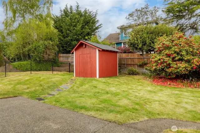 Backyard features a large patio, and a handy 8 x 10 storage shed.
