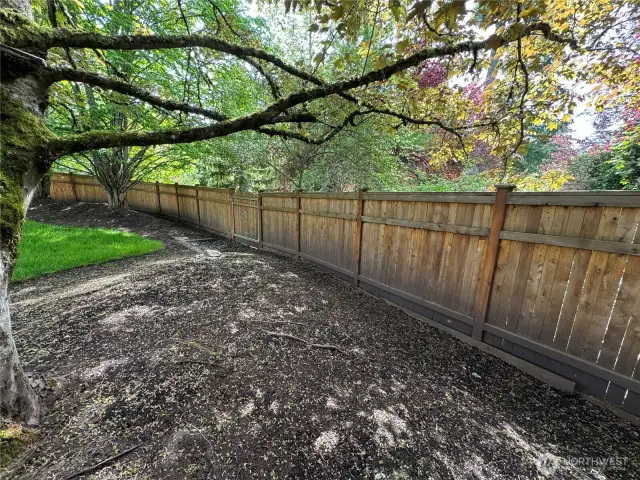 Private gate to greenbelt and neighborhood walkway.