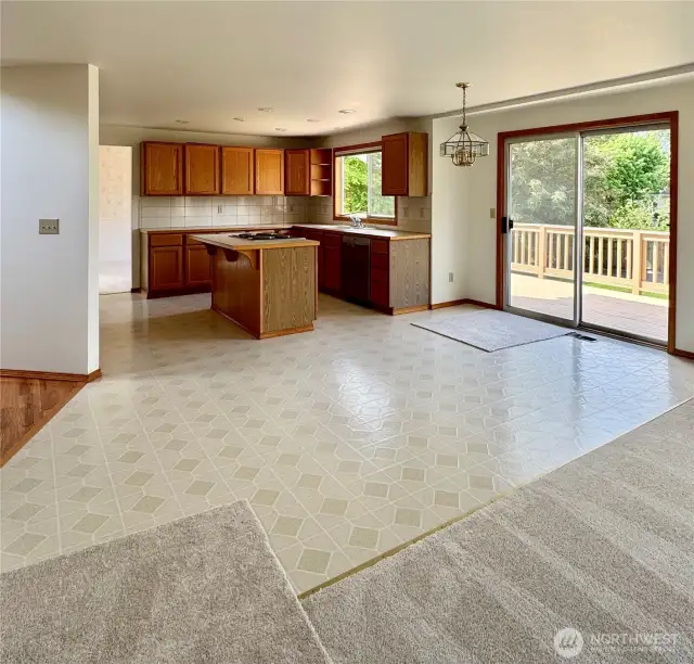 Well appointed kitchen open to family room with eating space and access to huge freshly painted deck.