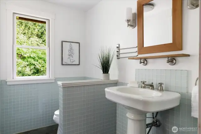 Main floor sink and toilet. Can be closed off from rest of bathroom.