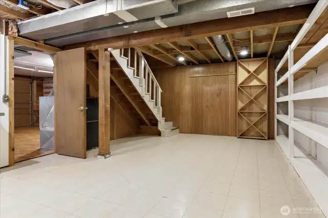 Stairs down to lower floor or basement. Loads of options and storage available.