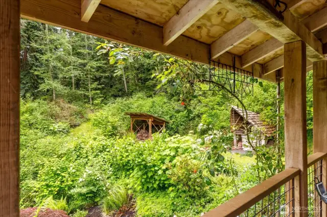 You can spot the cob oven and firewood stash.