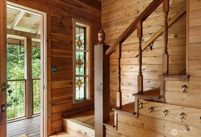 Warm wood walls, floors, and ceilings make this space feel warm and inviting.