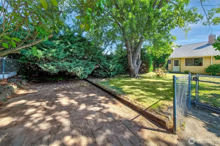 Gated RV parking plus a rolling gate on driveway