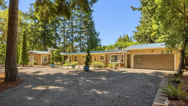 Very well updated home with a 2 car garage plus 10+ additional spots around the oversized roundabout.
