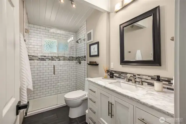 Third bathroom includes a walk in shower which is super convenient with having 3 total additional bedrooms.