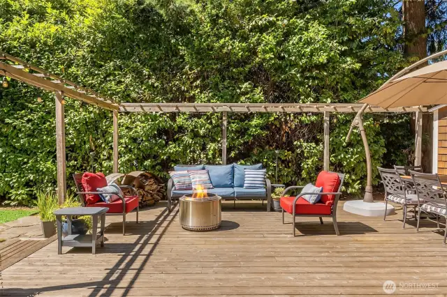 Welcome outside! Deck was just refreshed with new boards where needed, all with EcoWood treated cedar.