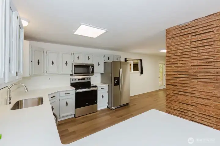 New countertops and all new appliances refrigerator, microwave, stove, and dishwasher.