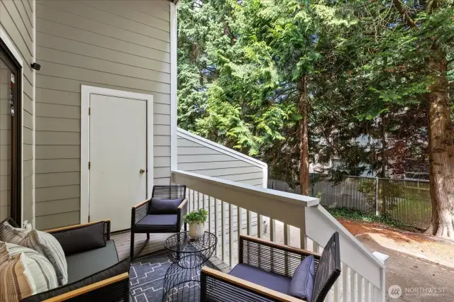Serene deck off of living area, perfect for outdoor entertaining and relaxation.