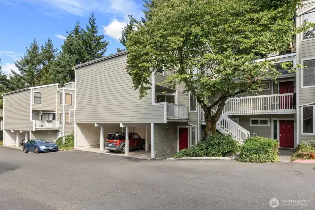 Well-maintained complex with carport and guest parking.