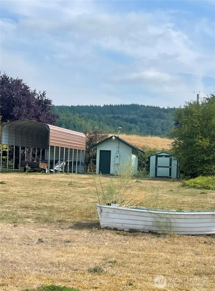 5. The RV carport, shed and well house.