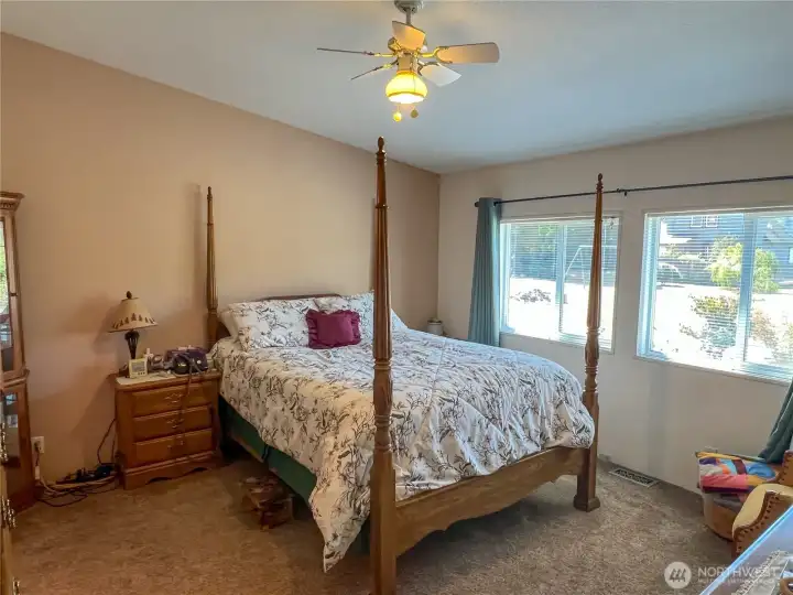 Primary suite. Wake up to Lake and Mt views every morning!