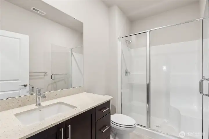 3/4 bath on main level will include white cabinetry.