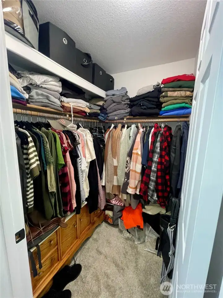 Primary walk-in closet...