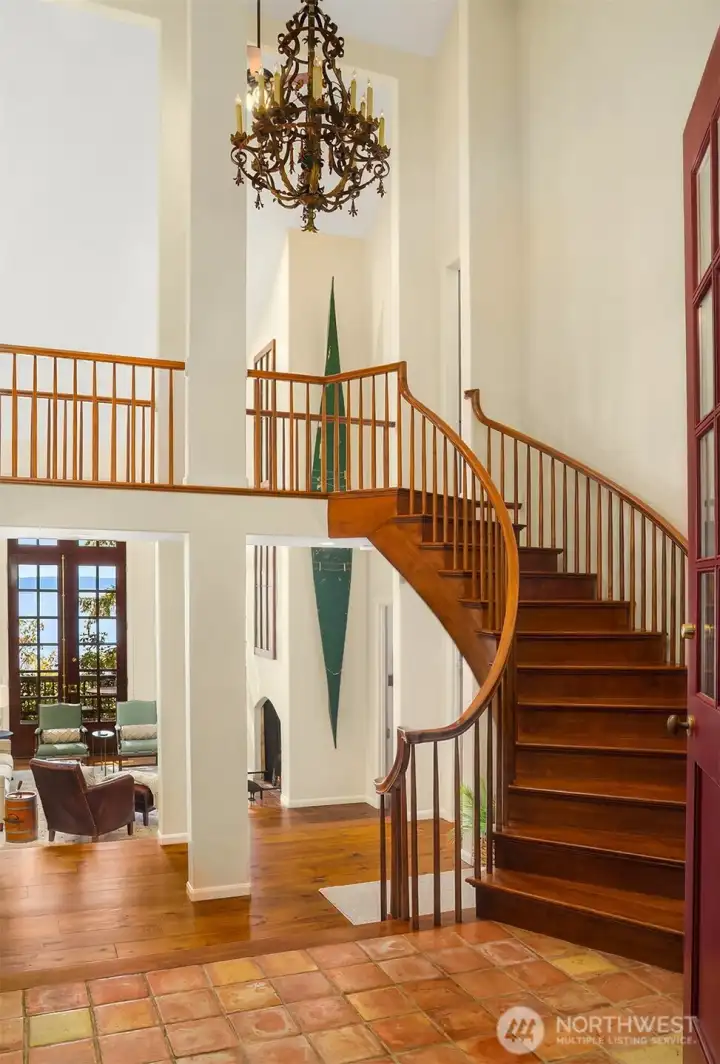 Grand staircase to second level with open walkway for visual access to the breathtaking view.
