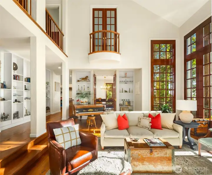 Built in bookshelves provide plentiful space for display of art, books, and photos.