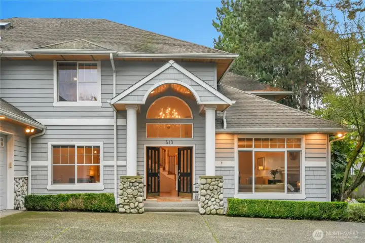 Beautiful craftsman home with stone and wood pillars welcome you in!