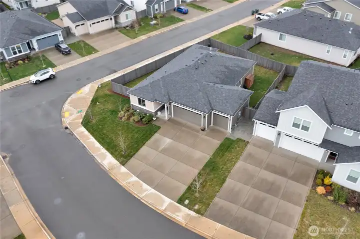 Large corner lot! Surrounded by mostly ramblers, for a PRIVATE backyard.