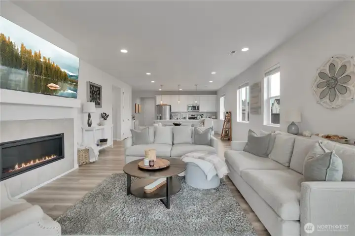 Spacious living room with gas fireplace ~