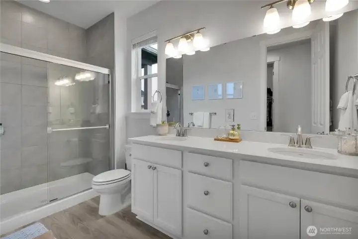 Primary bath with walk in shower & double sinks ~