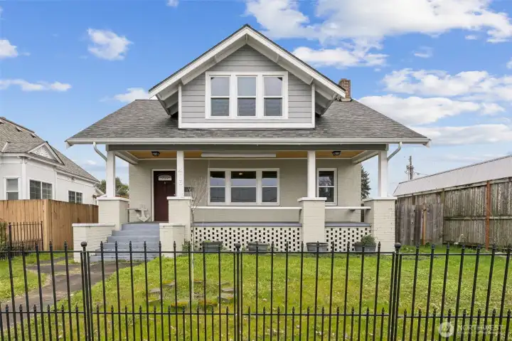 Enjoy the large covered patio and fully fenced yard