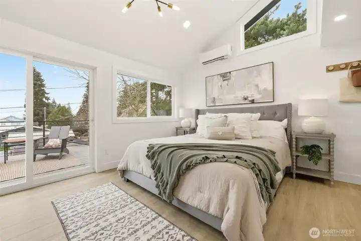 Primary suite has plenty of room and a private deck for morning coffee or watching the sunset with your favorite beverage.