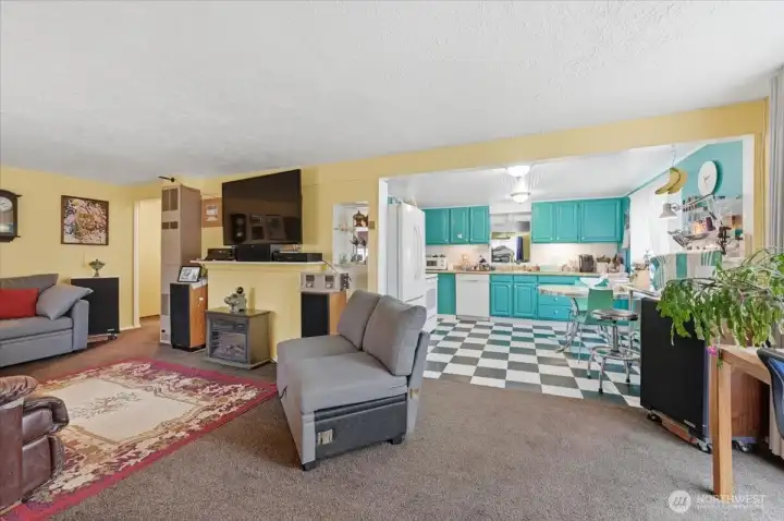 Desirable open floor plan (fireplace has been boarded off under the TV for heat efficiency)
