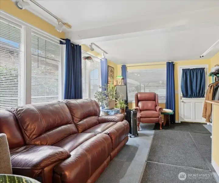 Bonus room has entry door from the carport