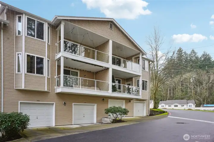 Tandem garage parking located behind the building